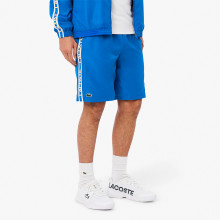 CAPSULA TECNICA LACOSTE CORTA