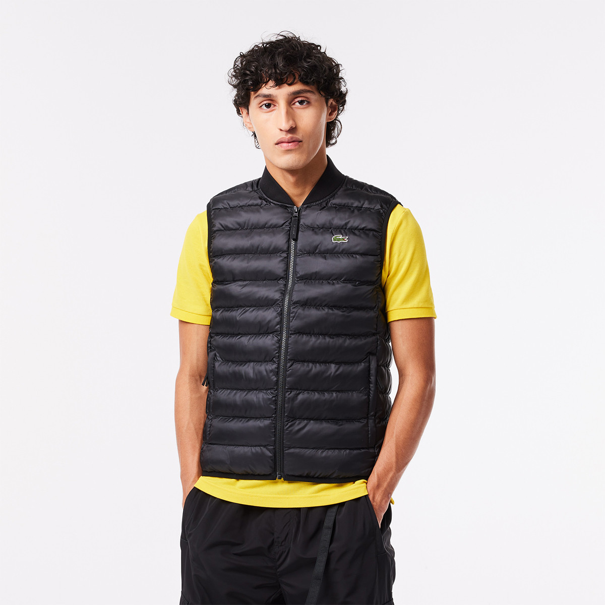 Piumino smanicato on sale lacoste